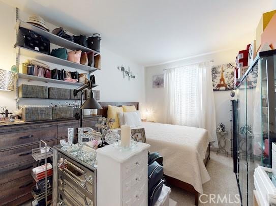 bedroom featuring carpet flooring