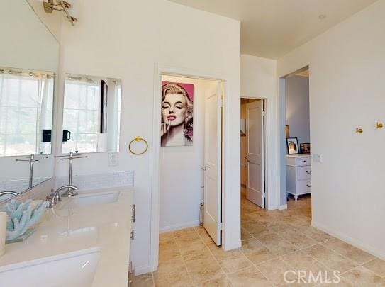 bathroom featuring a bathtub and sink