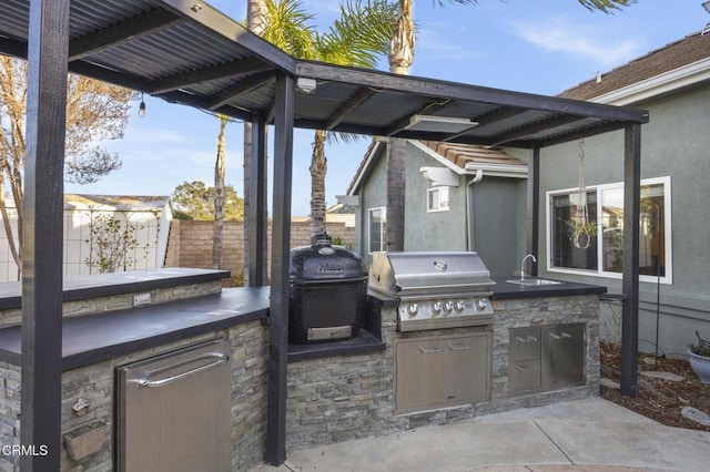 view of patio / terrace featuring sink, grilling area, and area for grilling