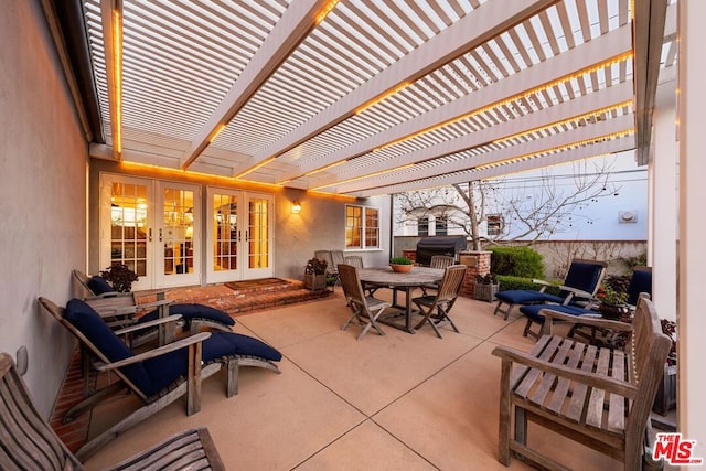 view of patio featuring french doors and a pergola