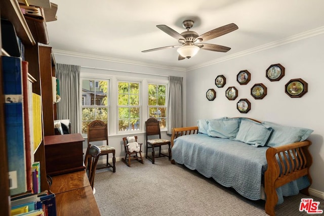 bedroom with ceiling fan, ornamental molding, and wood-type flooring