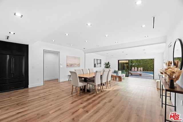 dining room with light hardwood / wood-style flooring