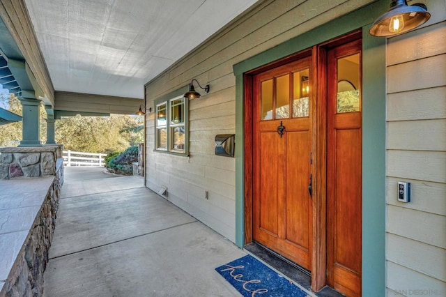 property entrance with a porch