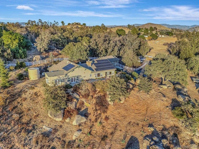 drone / aerial view featuring a mountain view