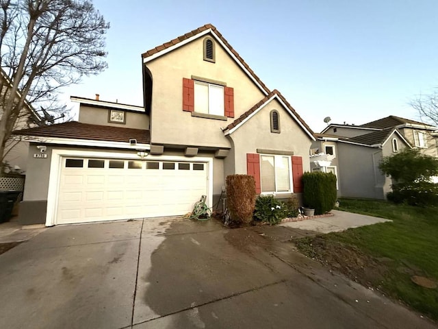 view of front of property with a garage