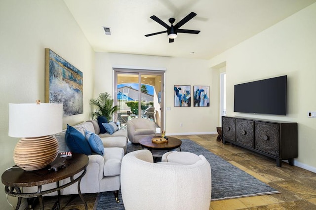 living room featuring ceiling fan