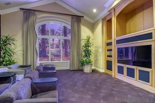 interior space featuring vaulted ceiling, dark carpet, and ornamental molding