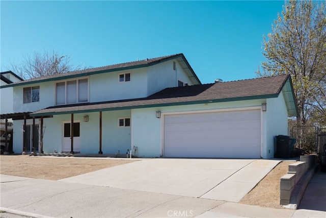 view of front of house featuring a porch and a garage