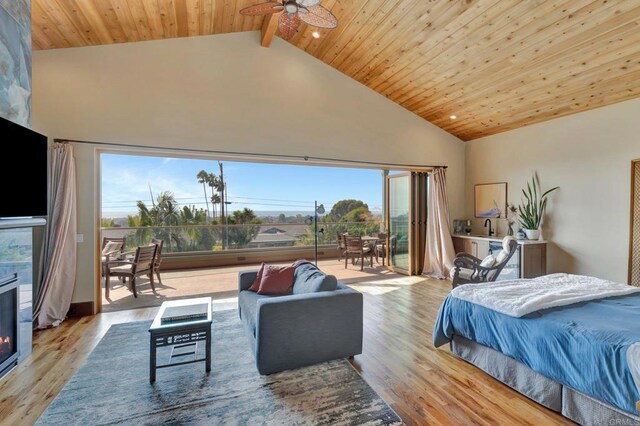 bedroom with high vaulted ceiling, wooden ceiling, light wood-type flooring, access to outside, and beamed ceiling