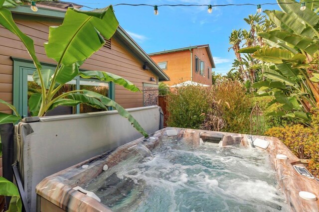 view of patio featuring a hot tub