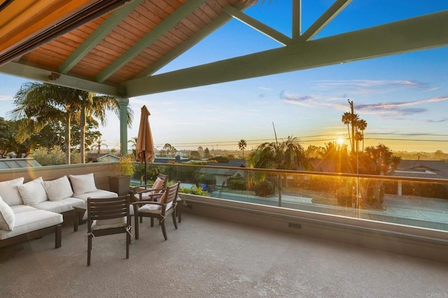 patio terrace at dusk with a gazebo and outdoor lounge area