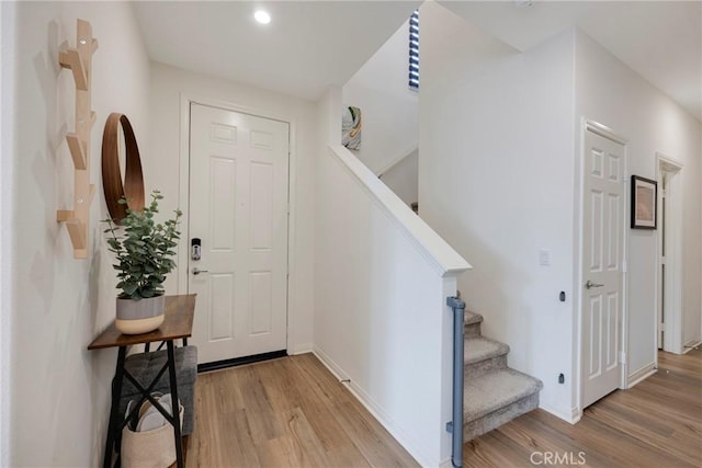 foyer entrance featuring light hardwood / wood-style flooring