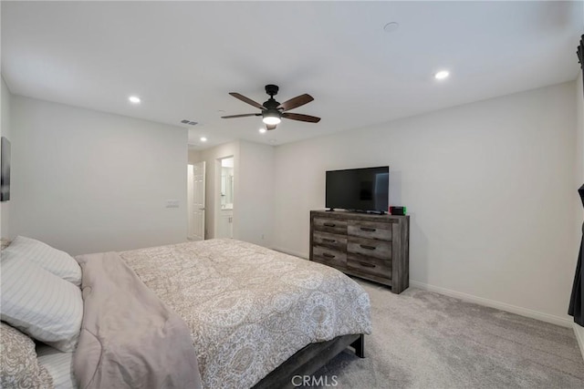 bedroom featuring light colored carpet and ceiling fan