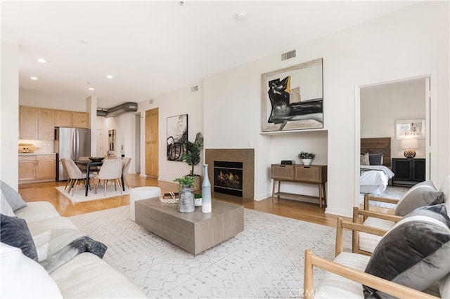 living room featuring light hardwood / wood-style floors