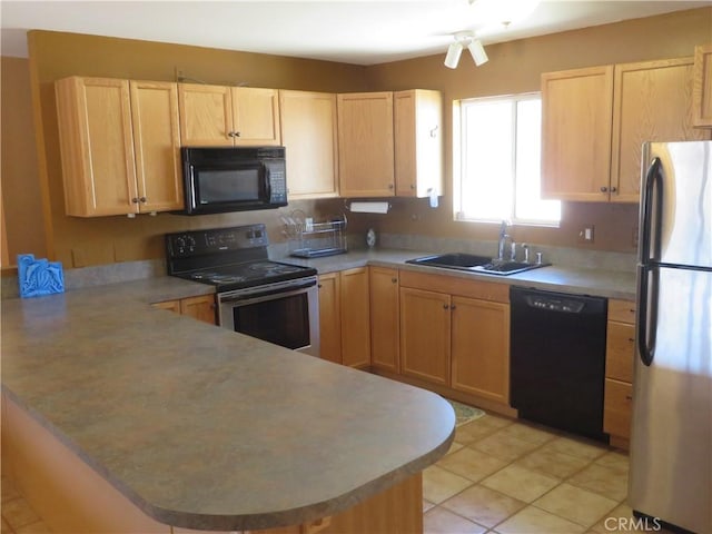 kitchen featuring light brown cabinetry, sink, kitchen peninsula, and black appliances