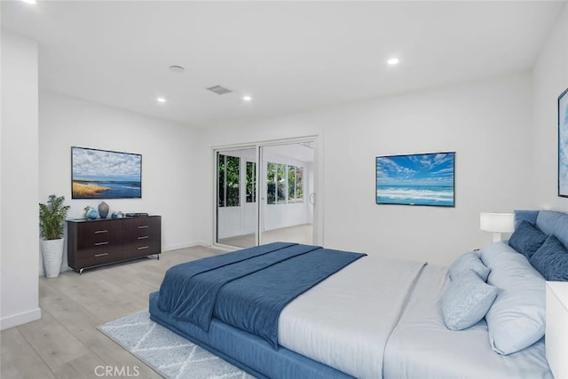 bedroom featuring light hardwood / wood-style flooring