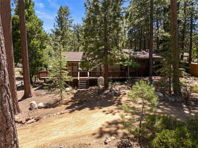 view of front facade featuring a wooden deck