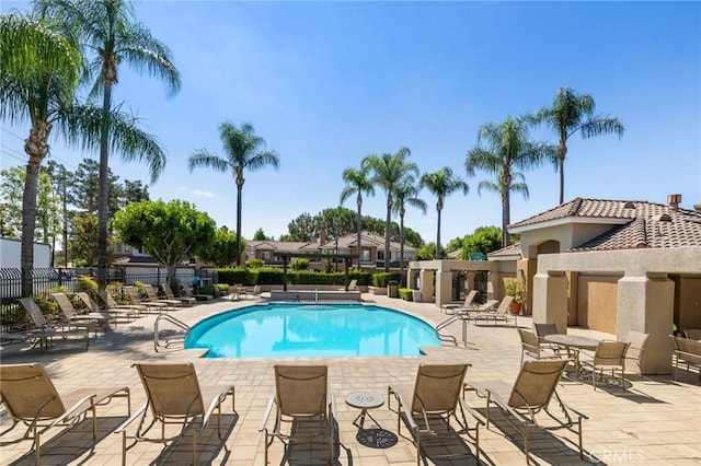 view of pool featuring a patio