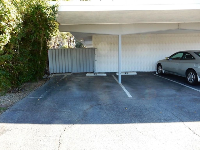 view of car parking with a carport