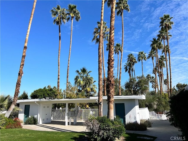 42278 Dunes View Rd Unit 28, Rancho Mirage, CA 92270 - rear view of property with stucco siding