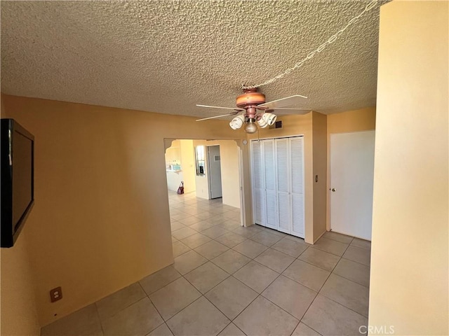 42278 Dunes View Rd Unit 28, Rancho Mirage, CA 92270 - spare room with ceiling fan, light tile patterned flooring, and a textured ceiling