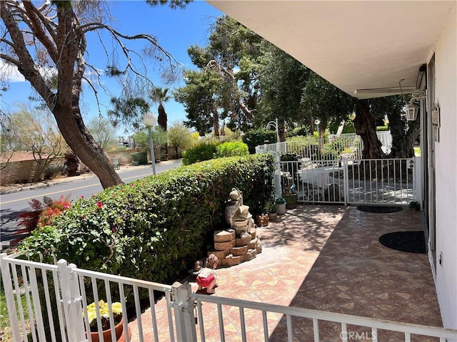 42278 Dunes View Rd Unit 28, Rancho Mirage, CA 92270 - view of patio / terrace with a gate