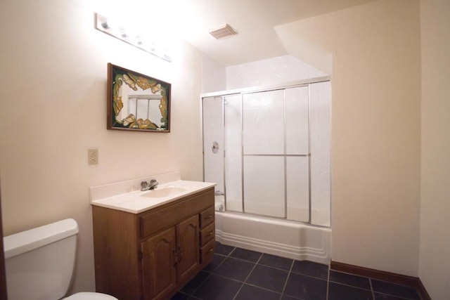 full bathroom with toilet, combined bath / shower with glass door, tile patterned flooring, and vanity