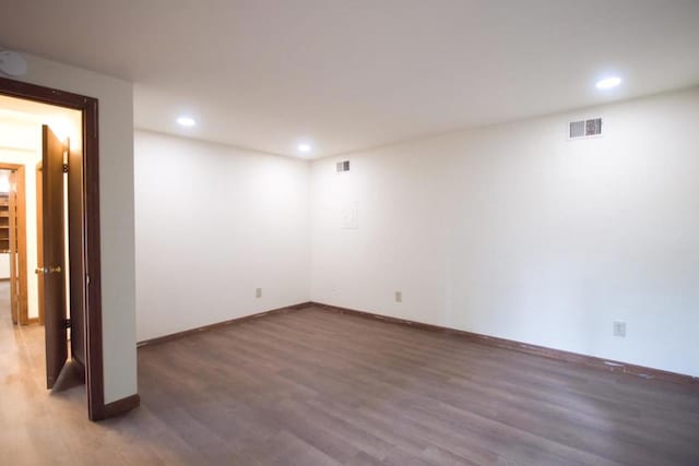 basement with dark wood-type flooring