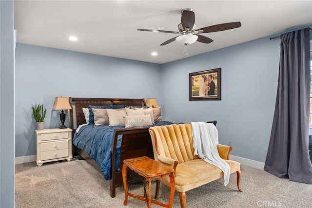 carpeted bedroom with ceiling fan