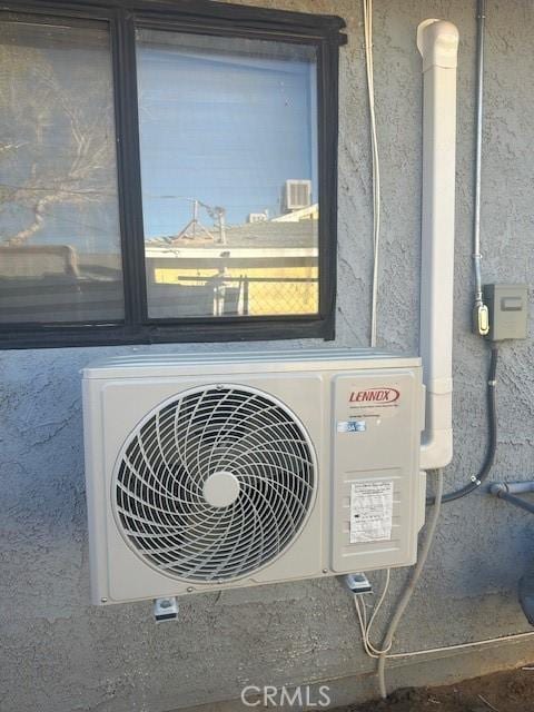 exterior details featuring ac unit