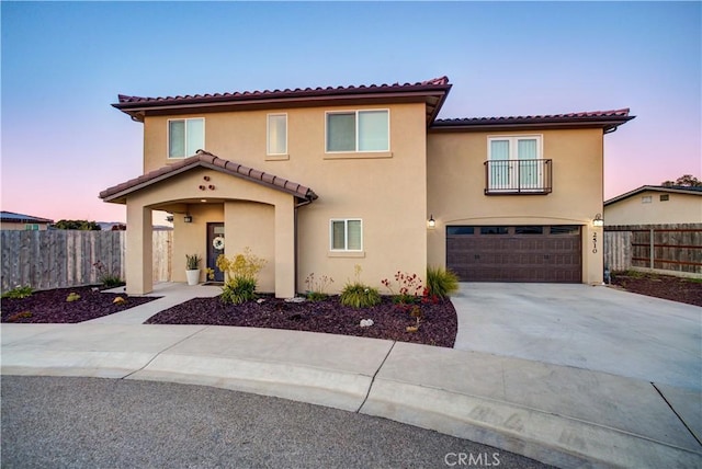 2510 Terrace Sands Ln, Oceano, CA 93445 - mediterranean / spanish house with a garage, a balcony, a tiled roof, and fence