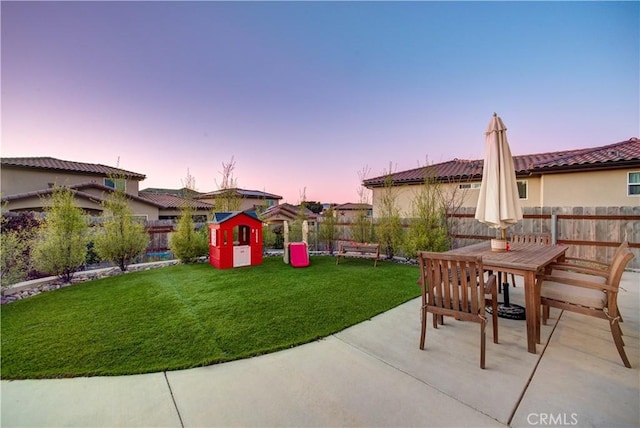 2510 Terrace Sands Ln, Oceano, CA 93445 - view of patio featuring a storage unit, an outbuilding, outdoor dining area, and a fenced backyard