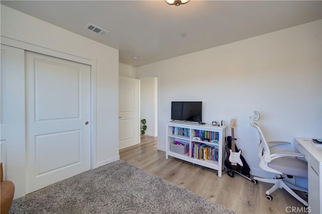 home office featuring light hardwood / wood-style flooring