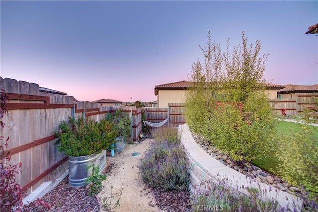 2510 Terrace Sands Ln, Oceano, CA 93445 - yard at dusk featuring a fenced backyard