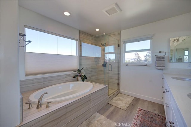 2510 Terrace Sands Ln, Oceano, CA 93445 - bathroom with a shower stall, double vanity, a bath, a sink, and baseboards