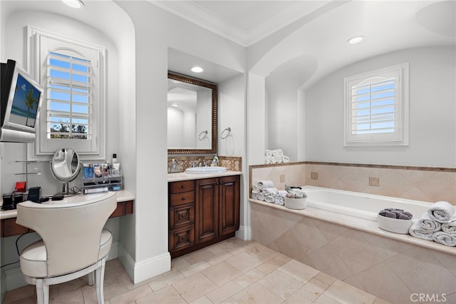 full bathroom with ornamental molding, tile patterned flooring, a garden tub, and vanity