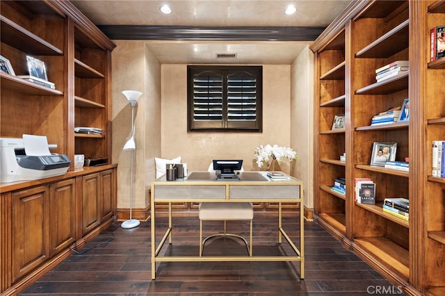 office with visible vents, built in shelves, baseboards, and dark wood-style flooring