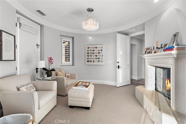 living room with light carpet, a lit fireplace, visible vents, and crown molding