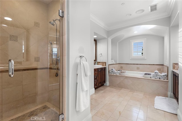 full bath featuring a garden tub, visible vents, ornamental molding, and vanity