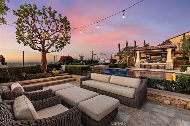 view of patio featuring an outdoor pool and an outdoor hangout area