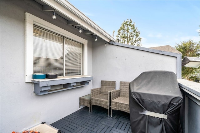 view of patio / terrace featuring a balcony and a grill