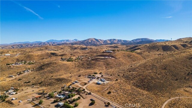 drone / aerial view featuring a mountain view