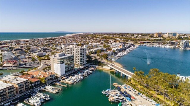 aerial view with a water view and a city view