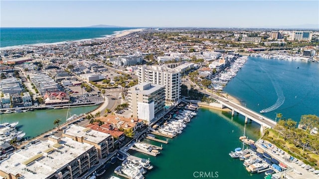 drone / aerial view with a water view and a view of city