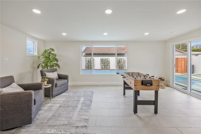 recreation room featuring light tile patterned floors