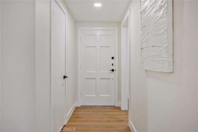 doorway to outside featuring light hardwood / wood-style flooring