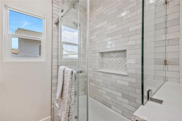 bathroom featuring enclosed tub / shower combo