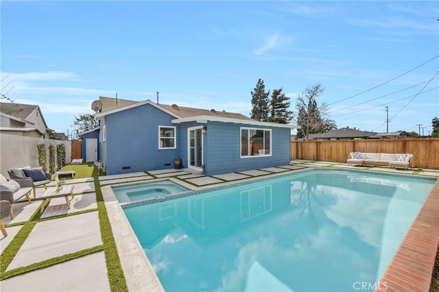 view of swimming pool with an in ground hot tub, a patio area, and outdoor lounge area