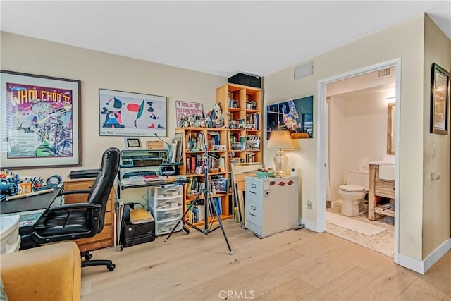 home office featuring light wood-type flooring