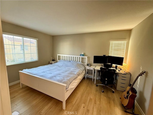 bedroom featuring light hardwood / wood-style flooring